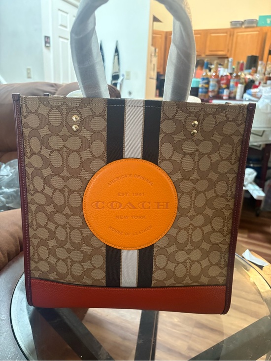 Coach Handbags - Coach women Signature Canvas Tote with Orange Patch and Brown Trim